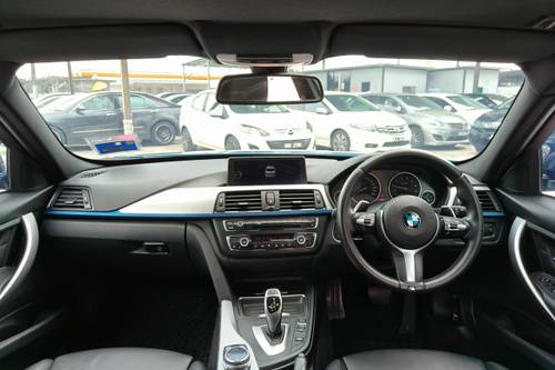 Old 2014 BMW 3 Series Sedan 328i